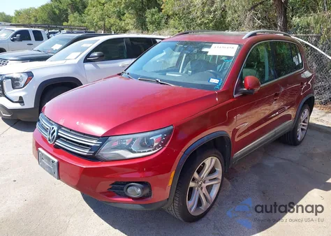 2012 Volkswagen Tiguan Sel z USA, uszkodzony, nr VIN WVGAV7AX0CW101188
